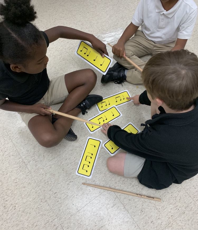 Students work on identifying music notes in class.